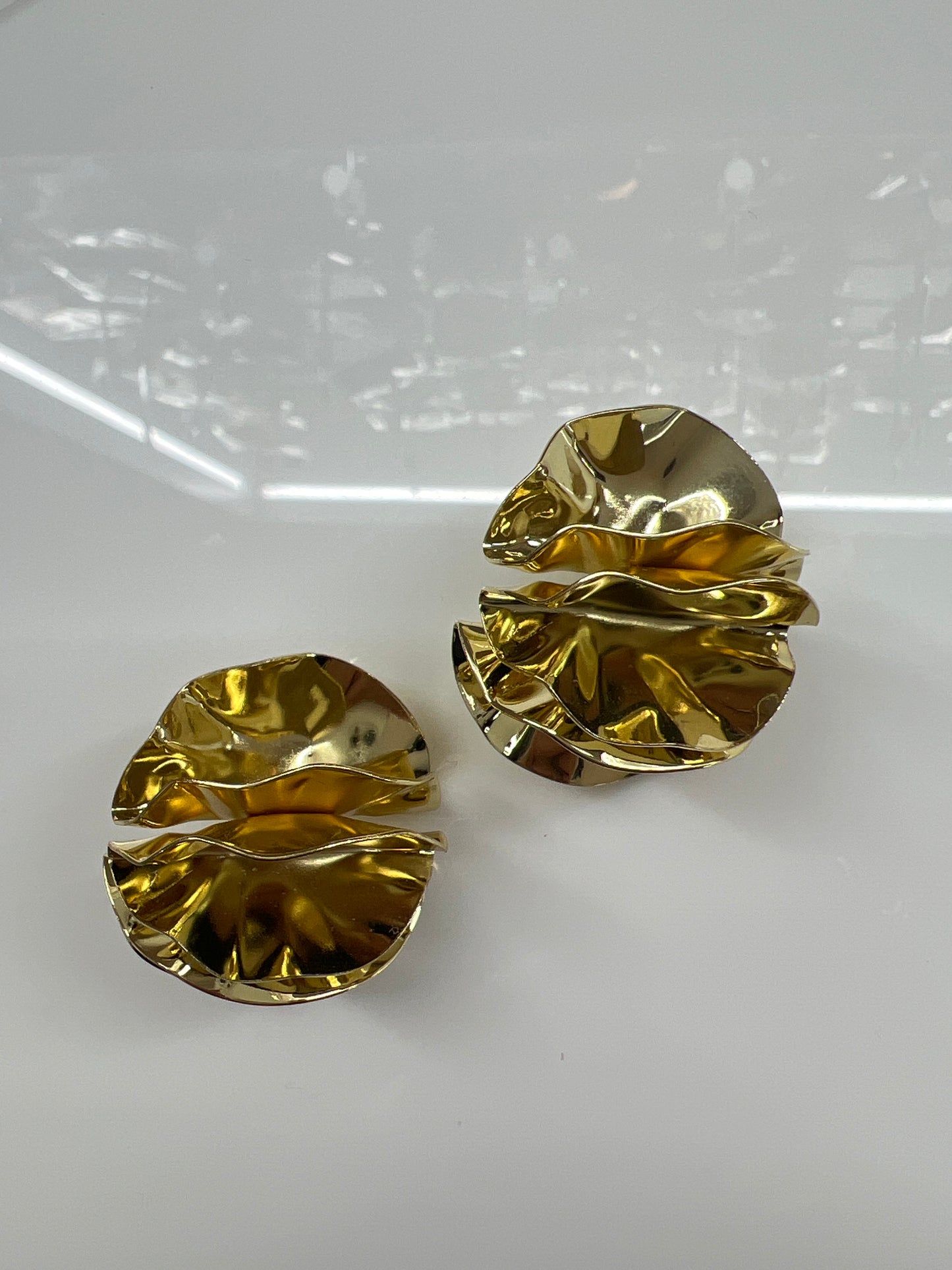 ARETE CIRCULO LÁMINAS DESPLEGADAS DORADAS